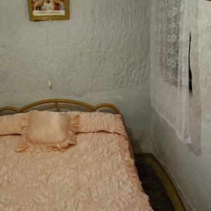 V podzemním obydlí, Purulena